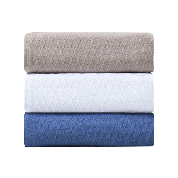Onkaparinga diamond bamboo cotton blanket stacked.