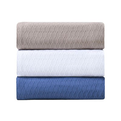 Onkaparinga diamond bamboo cotton blanket stacked.